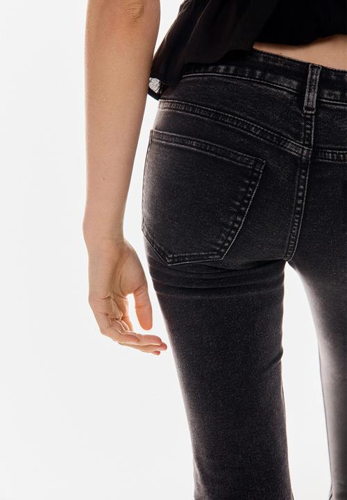H&M - Flared low jeans - dark grey flowers 