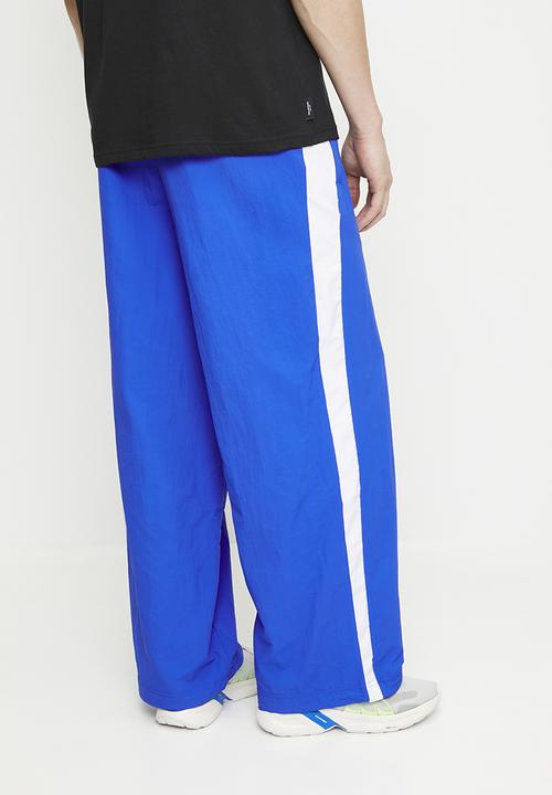 PUMA - T7 Oversized Woven Track Pants - PUMA Team