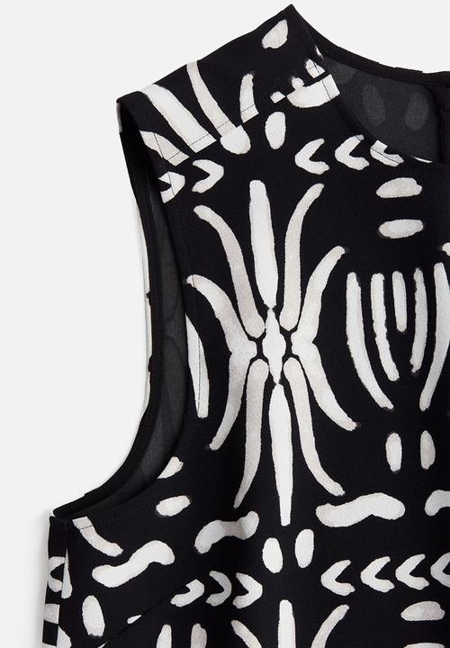 H&M - Sleeveless top - black & white patterned 