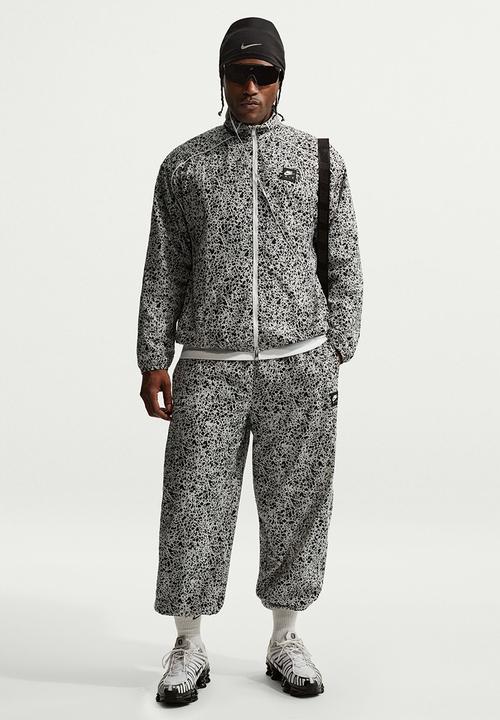 Nike - Nike Air Woven All Over Print Pant - Blak/Wht/Multi 