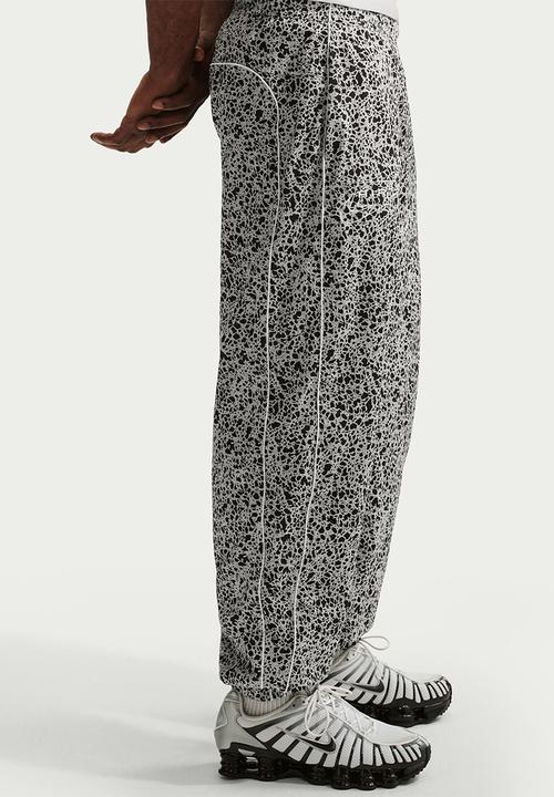 Nike - Nike Air Woven All Over Print Pant - Blak/Wht/Multi 