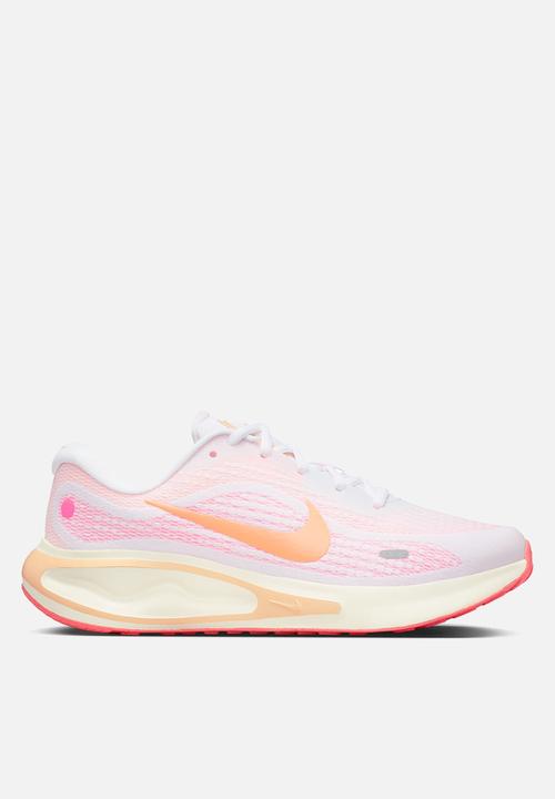 nike peach puff running shoes