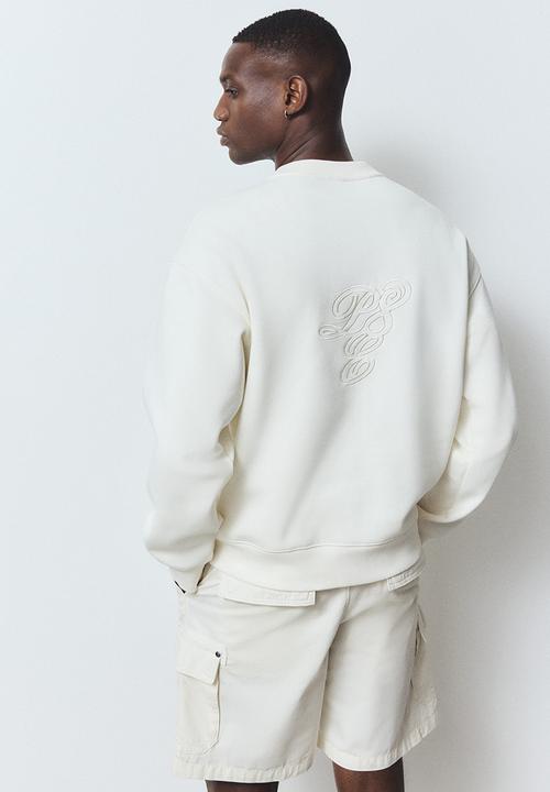 H&M - Regular fit printed sweatshirt - white club house
