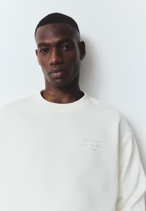 H&M - Regular fit printed sweatshirt - white club house