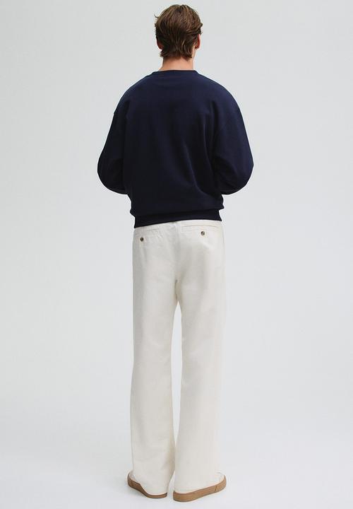 H&M - Relaxed fit cotton chinos - white