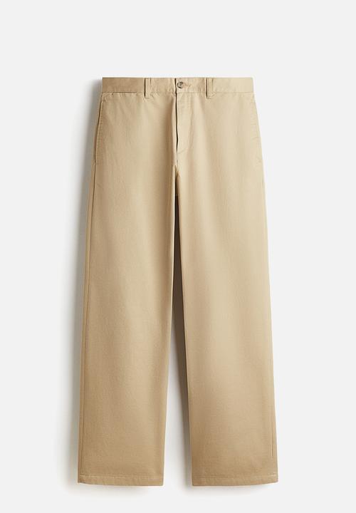 H&M - Relaxed fit cotton chinos - beige