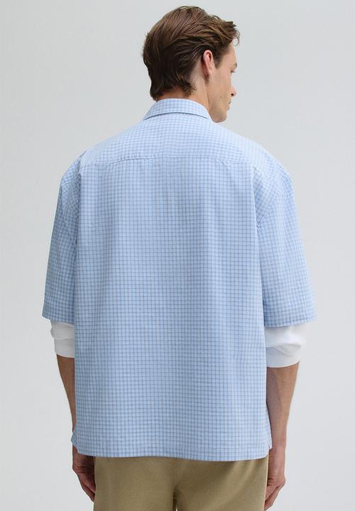 H&M - Relaxed fit short-sleeved shirt - light blue checked 