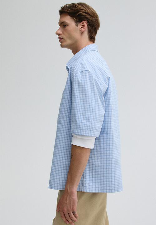H&M - Relaxed fit short-sleeved shirt - light blue checked 