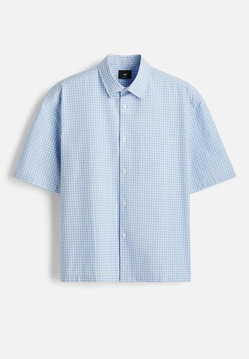 H&M - Relaxed fit short-sleeved shirt - light blue checked 