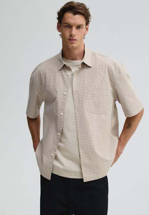 H&M - Relaxed fit short-sleeved shirt - beige checked