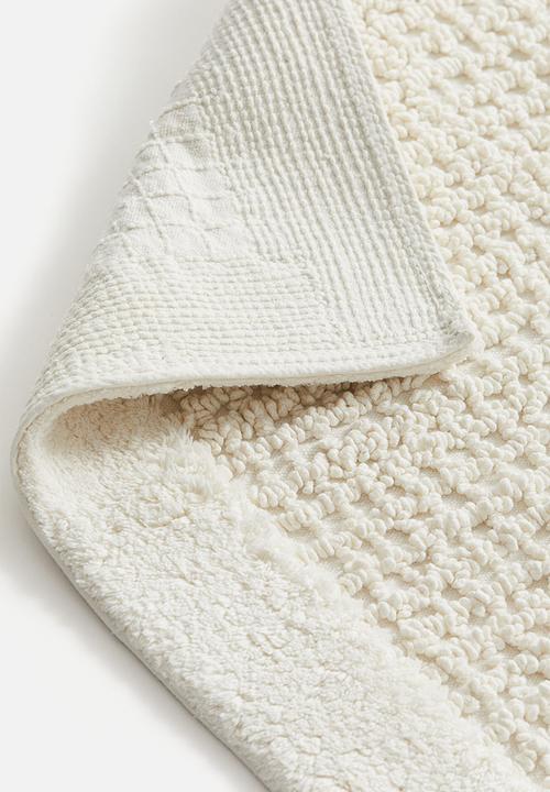 H&M - Tufted cotton bath mat - white