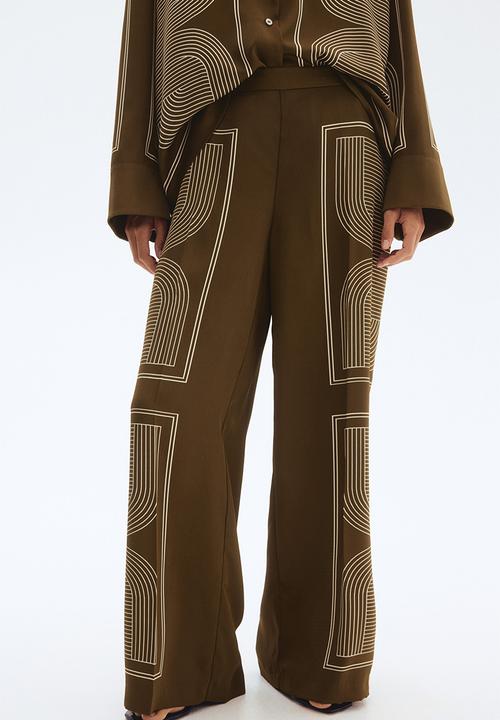 H&M - Straight trousers - dark khaki green/patterned
