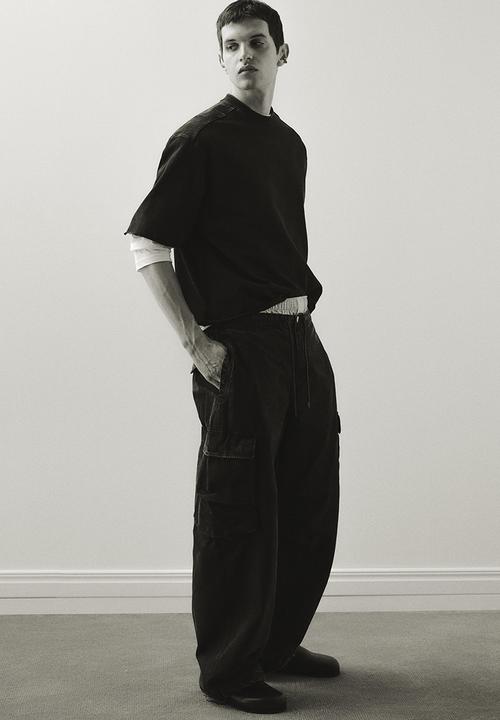 H&M - Loose fit washed cargo trousers - black