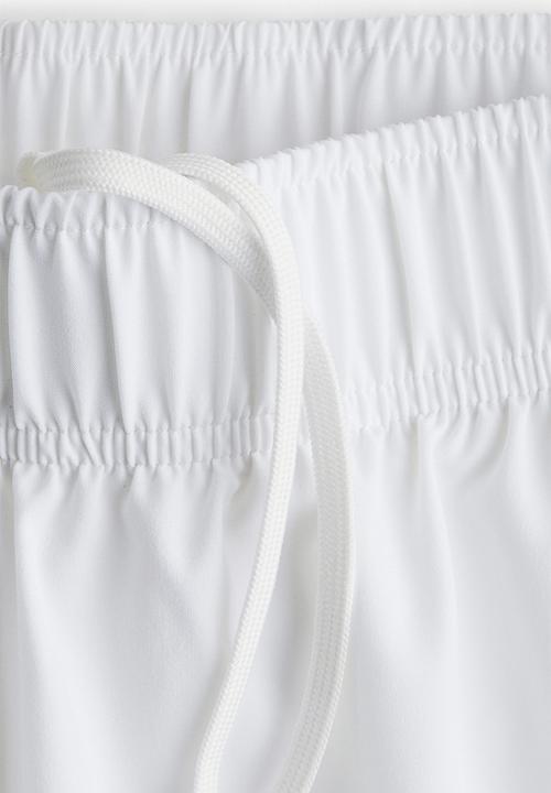 H&M - Double-layered running shorts with drymove™ - white