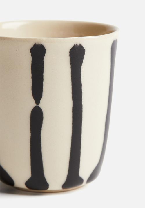 H&M - Drip-glazed stoneware mug - light beige/patterned