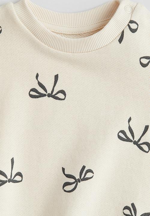 H&M - Printed sweatshirt - cream/bows 