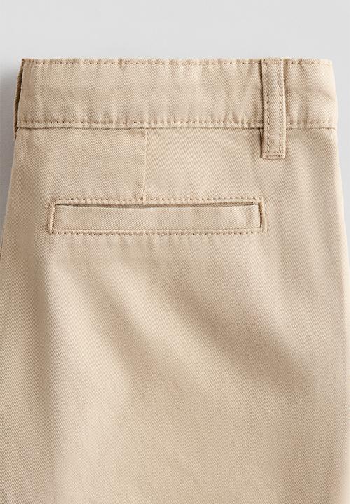 H&M - Loose-fit twill chinos - beige
