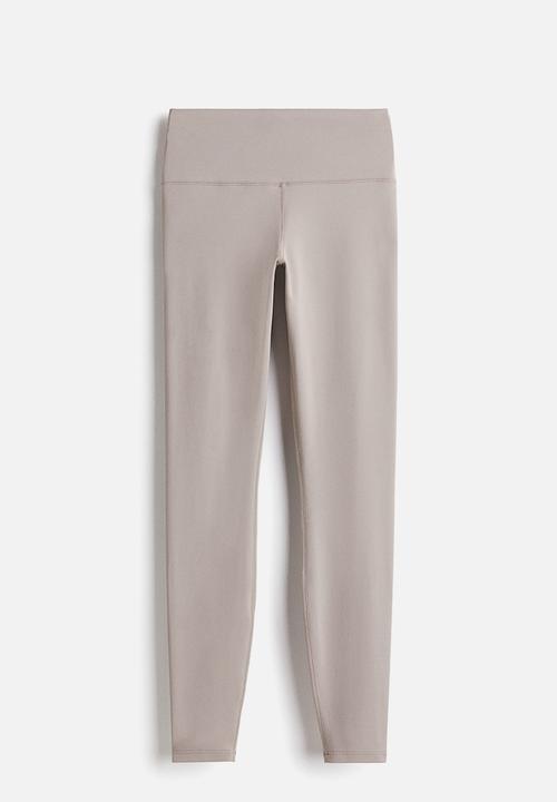 H&M - Yoga leggings with softmove™ lycra® - warm  grey