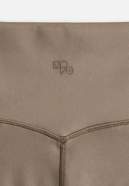 H&M - Sports cycling shorts with softmove™ - dark beige