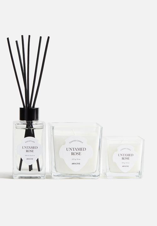 H&M - Scented candle in glass holder - untamed ros