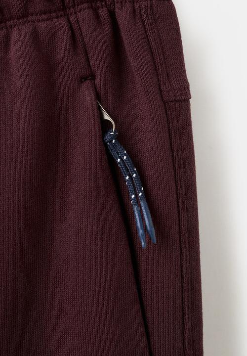 MANGO - Trousers FRESHZIP - Dark Red