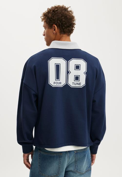 Cotton On - Cropped Fit Graphic Fleece Polo - Indigo Four Tune