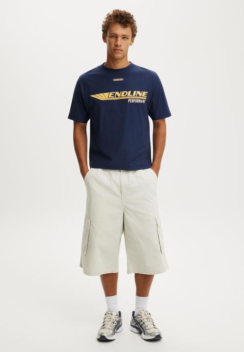 Cotton On - Cropped Fit Graphic T-shirt - Indigo/Endline