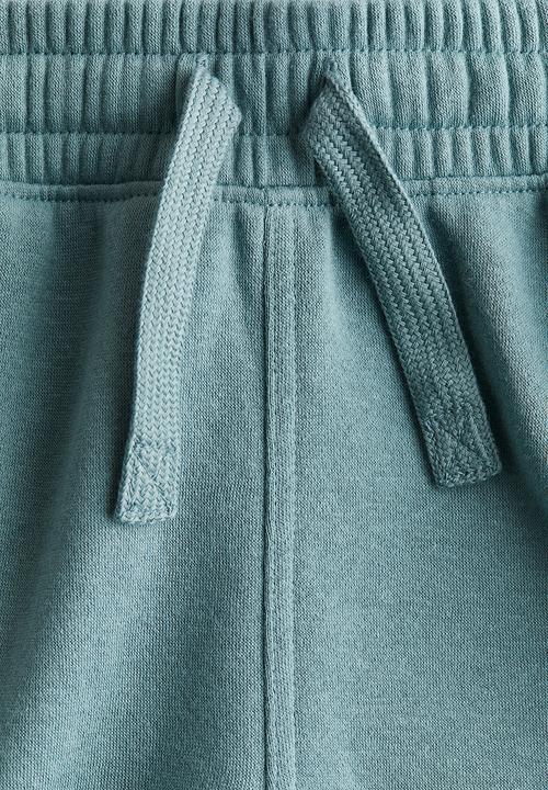 H&M - Cotton sweatshirt joggers - dusty turquoise