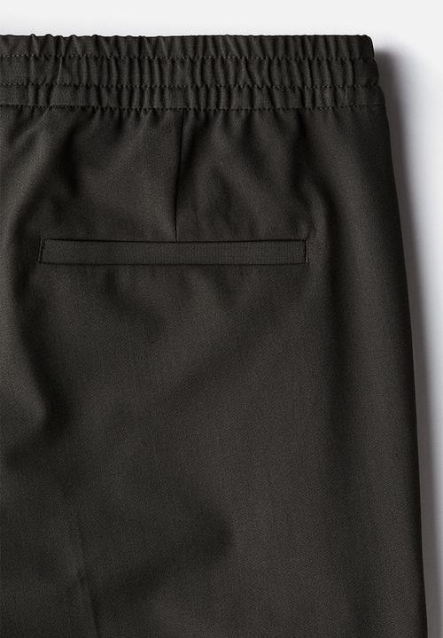 H&M - Slim fit tailored joggers - dark khaki green