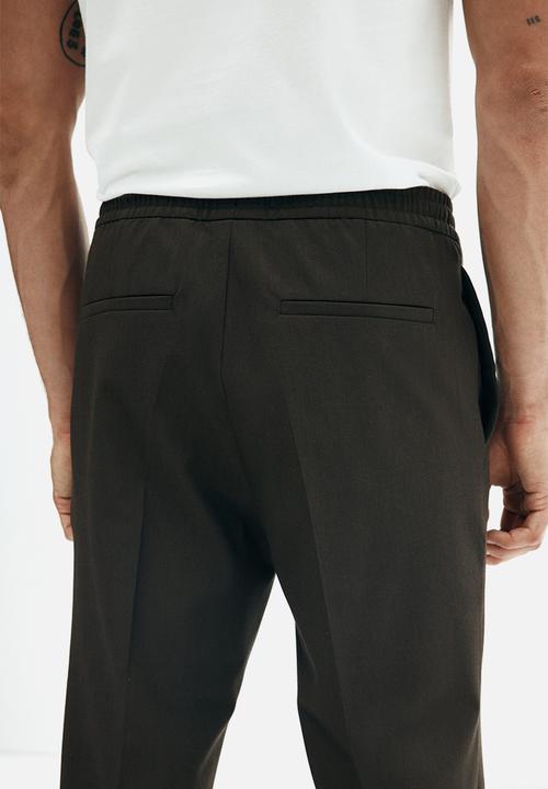 H&M - Slim fit tailored joggers - dark khaki green
