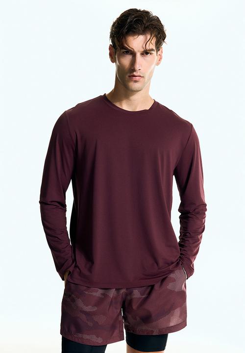 H&M - Long-sleeved sports top with drymove™ - light burgundy