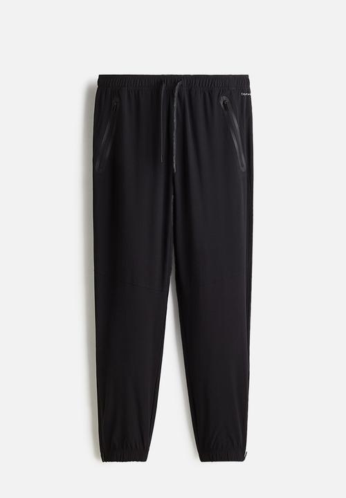 H&M - Regular fit sports joggers with drymove™ - black