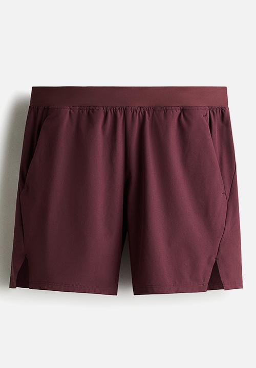 H&M - Mid-length sports shorts with drymove™ - light burgundy