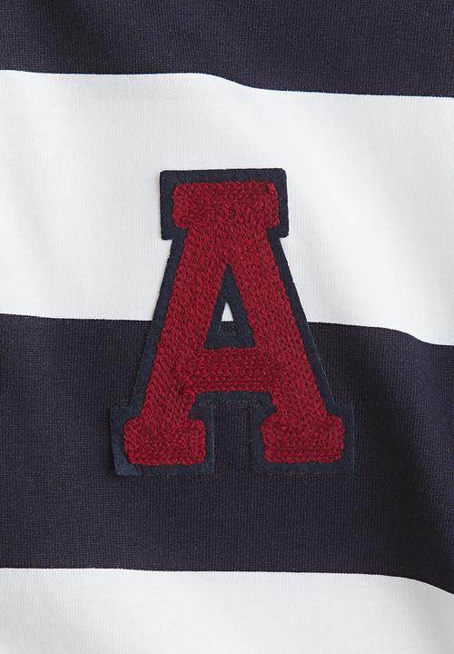 H&M - Motif-detail polo shirt - white/navy blue