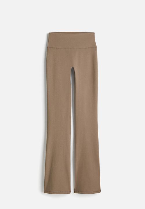 H&M - Flared sports leggings with softmove™ - dark beige