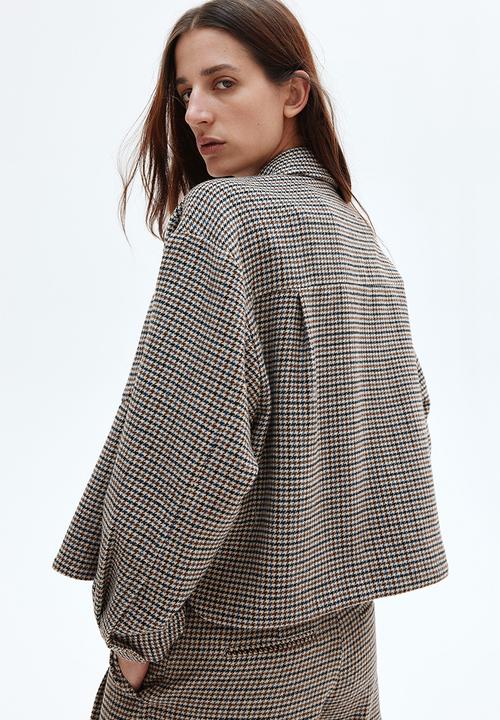 H&M - Pleated skort - light beige dogtooth pattern