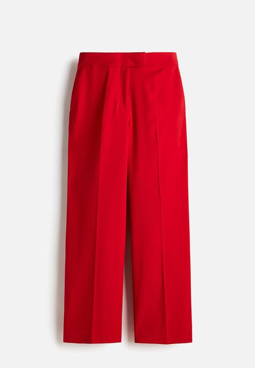 H&M - Straight trousers - bright red 