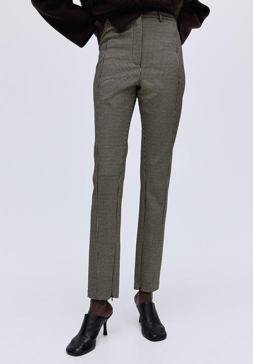 H&M - Fitted jersey trousers - light beige/dogtooth pattern 