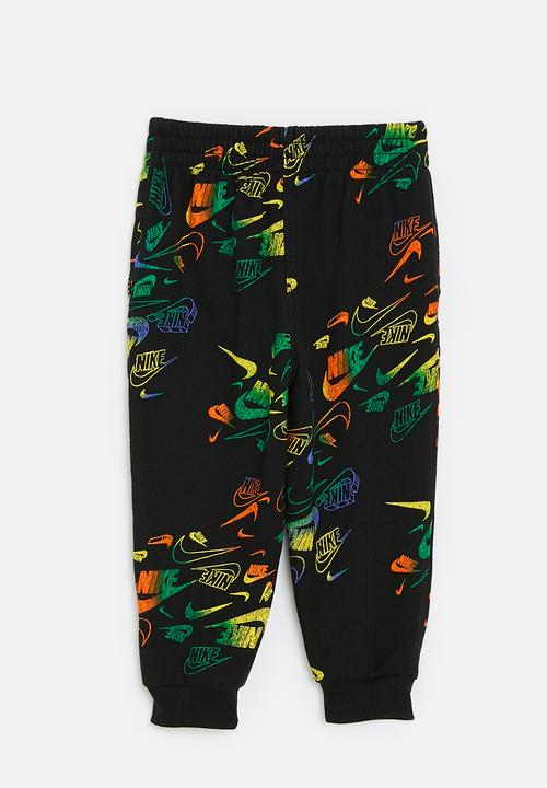 Nike - Nike all-over print reveal joggers - black