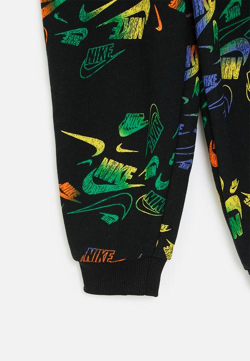 Nike - Nike all-over print reveal joggers - black