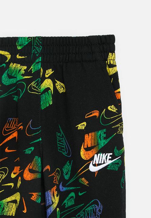 Nike - Nike all-over print reveal joggers - black