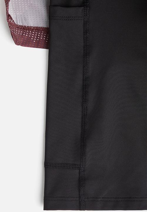 H&M - Double-layered sports shorts with drymove™ - light burgundy/patterned 