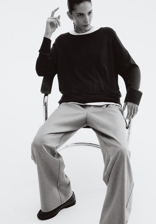 H&M - Wide trousers - greige marl 