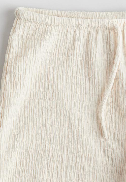 H&M - Textured jersey trousers - light beige