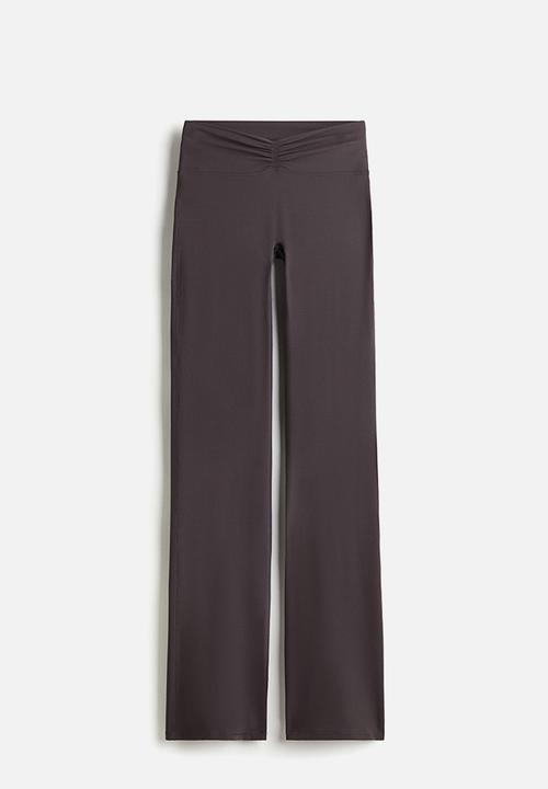 H&M - Flared yoga leggings with softmove™ lycra® - truffle grey