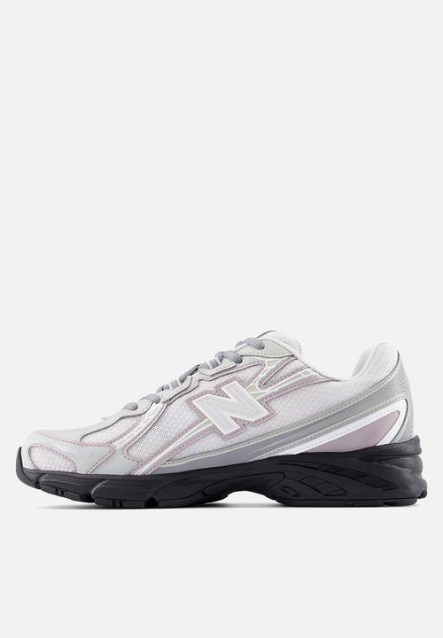 New Balance  - U7403UQ
