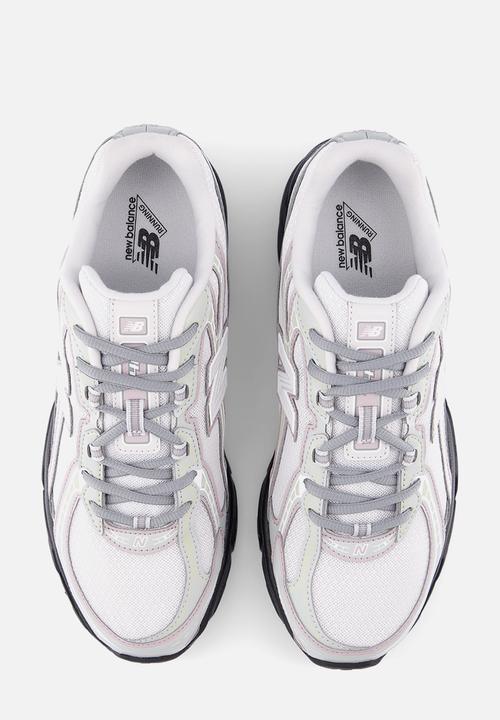 New Balance  - U7403UQ