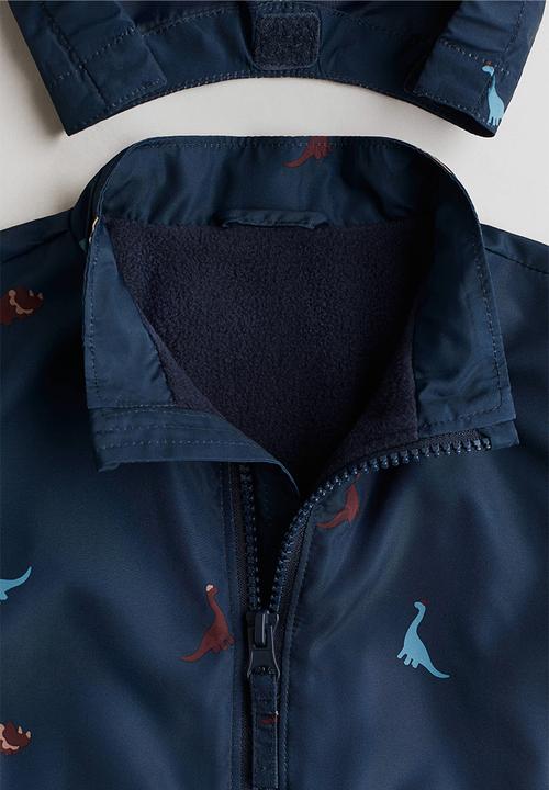 H&M - Fleece-lined jacket - navy blue/dinosaurs