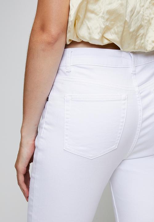 Izabel London - Mid Waist 5 Pocket Crop Length Overdye Jean With Side Slit - White