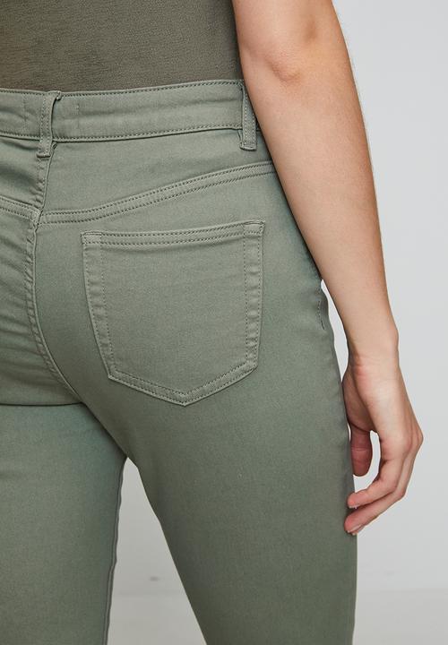 Izabel London - Mid Waist 5 Pocket Crop Length Overdye Jean With Side Slit - Khaki